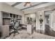 This home office features custom built-ins, and a work space that is both stylish and functional at 21666 N 53Rd Dr, Glendale, AZ 85308