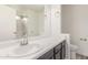 Bathroom with white countertop, undermount sink, and brushed nickel faucet and accessories at 2551 E Kent Ave, Gilbert, AZ 85296