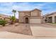 Charming two-story home with a two-car garage and desert landscaping at 2551 E Kent Ave, Gilbert, AZ 85296