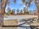 Enjoy a game on the community basketball court, surrounded by mature shade trees at 25601 W Coles Rd, Buckeye, AZ 85326