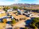 Aerial view showcasing the property's surroundings and mountain views at 26631 S Lime Dr, Queen Creek, AZ 85142