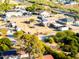 Expansive aerial view of a sprawling desert property with multiple outbuildings and residences at 26631 S Lime Dr, Queen Creek, AZ 85142