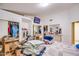 Bright bedroom featuring neutral walls and carpet. Storage areas can be found throughout at 26631 S Lime Dr, Queen Creek, AZ 85142