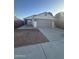 Charming single-story home featuring a two-car garage and desert landscaping at 2837 W Angela Dr, Phoenix, AZ 85053