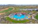 Resort style community pool with lounge chairs and umbrellas surrounded by lush landscaping at 29348 N Clear Ridge Rd, Rio Verde, AZ 85263