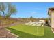 Beautifully landscaped backyard with a putting green and desert views at 29348 N Clear Ridge Rd, Rio Verde, AZ 85263