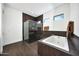 Contemporary bathroom featuring a glass-enclosed shower and a soaking tub at 29348 N Clear Ridge Rd, Rio Verde, AZ 85263