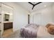 Bright bedroom featuring neutral walls, carpet, and large closet doors at 29348 N Clear Ridge Rd, Rio Verde, AZ 85263