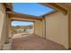 Front courtyard features desert landscaping, brick pavers, and a covered entry at 29348 N Clear Ridge Rd, Rio Verde, AZ 85263