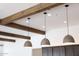 Pendant lights and wooden beams give this kitchen a luxury feel at 29348 N Clear Ridge Rd, Rio Verde, AZ 85263