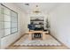 Bright home office with modern fixtures, a large window, and a minimalist design at 29348 N Clear Ridge Rd, Rio Verde, AZ 85263