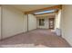 Covered patio featuring brick pavers, a skylight, and a stylish front door at 29348 N Clear Ridge Rd, Rio Verde, AZ 85263