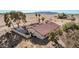 Aerial view of a single-Gathering home, showcasing its spacious lot, desert landscape, and privacy fence at 3279 E Selma Hwy, Casa Grande, AZ 85194