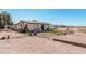 Exterior shot of the residence, showing the yard and house style at 3279 E Selma Hwy, Casa Grande, AZ 85194