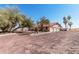 Spacious single-story home with desert landscaping, a tile roof, and an attached two-car garage at 3279 E Selma Hwy, Casa Grande, AZ 85194