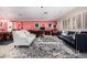 Elegant living room featuring a glass coffee table, plush sofas, and decorative accents at 3279 E Selma Hwy, Casa Grande, AZ 85194