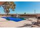 Backyard features a refreshing pool with a diving board and slide, perfect for summer fun at 3279 E Selma Hwy, Casa Grande, AZ 85194