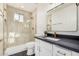 Bright bathroom featuring a glass-enclosed shower and sleek vanity at 3354 N 157Th Ave, Goodyear, AZ 85395