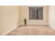 Bedroom showcasing hardwood floors, base molding, and a window at 3354 N 157Th Ave, Goodyear, AZ 85395