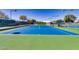 Well-maintained tennis courts with clear blue skies, providing a great space for sports and recreation at 3354 N 157Th Ave, Goodyear, AZ 85395