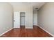 Bedroom featuring hardwood floors and a closet at 3416 E Blue Ridge Pl, Chandler, AZ 85249