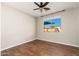 Bedroom has a wood floor and a large window with a view of the backyard at 3416 E Blue Ridge Pl, Chandler, AZ 85249