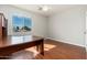 Bright bedroom featuring wood floors and a large window with a view at 3416 E Blue Ridge Pl, Chandler, AZ 85249