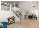 Bright entryway featuring staircase, dining room, and stylish decor at 3416 E Blue Ridge Pl, Chandler, AZ 85249