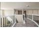 Hallway with carpet and white railings leads to more living space at 3416 E Blue Ridge Pl, Chandler, AZ 85249