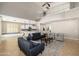 Spacious living room featuring modern furnishings and open floor plan to the kitchen at 3416 E Blue Ridge Pl, Chandler, AZ 85249