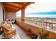 Relaxing covered balcony featuring comfortable seating and stunning desert views, perfect for enjoying the outdoors at 36601 N Mule Train Rd # D30, Carefree, AZ 85377