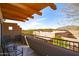 Outdoor balcony with seating offers stunning views of the desert landscape, providing a serene retreat for relaxation and enjoyment at 36601 N Mule Train Rd # D30, Carefree, AZ 85377