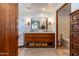 Elegant bathroom featuring a double vanity, marble countertop, and modern fixtures for a luxurious feel at 36601 N Mule Train Rd # D30, Carefree, AZ 85377