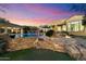 Outdoor living with tiered patio, pool and verdant, mature landscaping at 37080 N 109Th Way, Scottsdale, AZ 85262