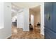 Bright foyer with tile flooring, white walls, and views into the living room and dining area at 37080 N 109Th Way, Scottsdale, AZ 85262