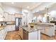 Open-concept kitchen featuring a central island, stainless steel appliances, and granite countertops at 37080 N 109Th Way, Scottsdale, AZ 85262