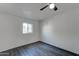 Bedroom features wood-look floors, neutral paint and ceiling fan at 3714 E Polk St, Phoenix, AZ 85008