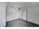 Bedroom features wood-look floors, neutral paint and interior door at 3714 E Polk St, Phoenix, AZ 85008