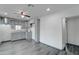 Modern kitchen featuring new flooring and ample cabinet space at 3714 E Polk St, Phoenix, AZ 85008