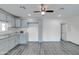 Modern kitchen featuring new flooring and ample cabinet space at 3714 E Polk St, Phoenix, AZ 85008