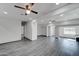 Spacious living room featuring modern flooring, recessed lighting, and an open layout at 3714 E Polk St, Phoenix, AZ 85008