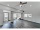 Bright open-concept living room features wood-look floors and recessed lighting at 3714 E Polk St, Phoenix, AZ 85008