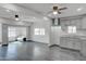 Spacious living room featuring modern flooring, recessed lighting, and an open layout at 3714 E Polk St, Phoenix, AZ 85008