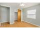 Bedroom featuring ample closet space, ceiling fan, and bright window, offering a comfortable retreat at 398 W Elgin St, Chandler, AZ 85225