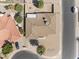 An aerial view showcases this home's roof, driveway, landscaping, and ideal location in a desirable neighborhood at 4662 E Escondido Ave, Mesa, AZ 85206