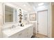 Bright bathroom with a double sink vanity, marble countertops, and modern fixtures at 4702 E Monte Cristo Ave, Phoenix, AZ 85032