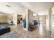 Spacious living room features tile flooring, an open floor plan, and neutral tones that create a comfortable atmosphere at 4702 E Monte Cristo Ave, Phoenix, AZ 85032