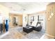 Inviting living room showcasing tiled floors, a cozy fireplace, and a comfortable sofa, perfect for relaxation at 4702 E Monte Cristo Ave, Phoenix, AZ 85032