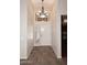 Inviting entryway with tile flooring and a decorative chandelier fixture at 4733 E Morning Vista Ln, Cave Creek, AZ 85331