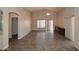 Bright living room with tile floors, fan, and sliding glass doors at 4733 E Morning Vista Ln, Cave Creek, AZ 85331